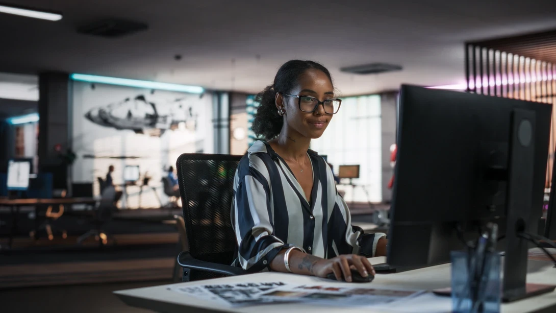Woman Using AI to Draft Multiple Emails in Multiple Languages Instantly