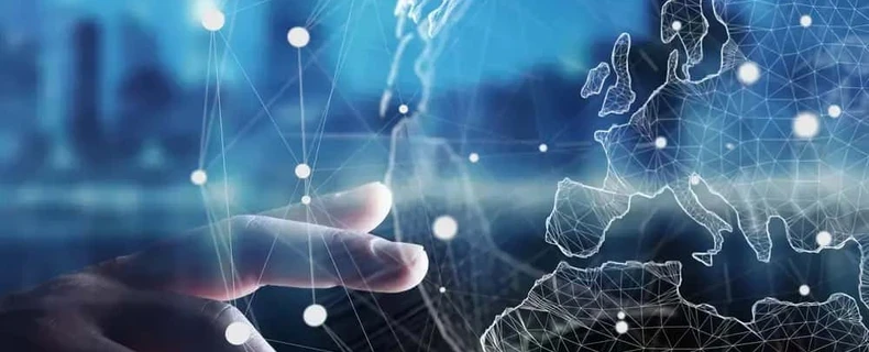 Hand reaching out towards global economy