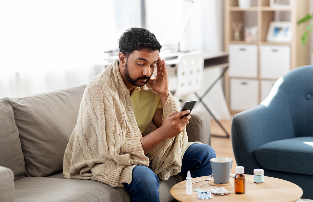 sick patient using phone